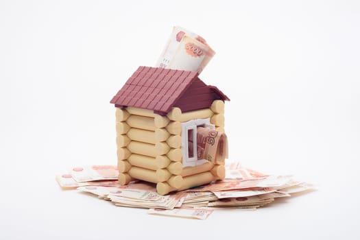 Five-thousandth Russian banknotes stick out from the house