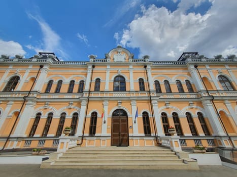 Wide angle shot of Manuc Bei mansion, architectural, culture and historic complex with museum, winery and other edifices, Hincesti, Moldova. Manuc Bey palace facade panoramic view..