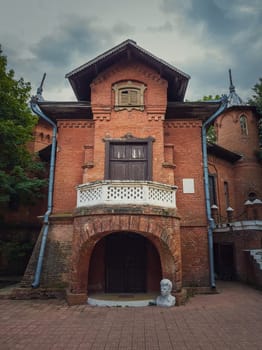 The Hunting Castle facade, Manuc Bei mansion, architectural, culture and historic complex of Hincesti city, Moldova. Ancient brick building. Halloween haunted house theme concept, ghost home or manor.