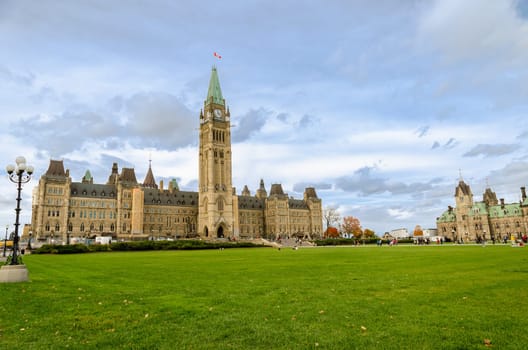 Ottawa, Canada - October 14, 2018 : Parliament Hill in Ottawa, Canada. Facade view of Centre Block and East Block of Canadian Parliamentary complex in autumn