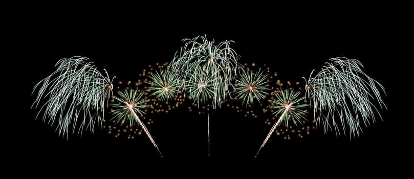 Beautiful green fireworks display isolated on black background for celebration and anniversary