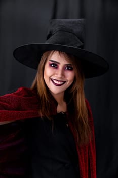 Portrait of asian young adult teenage woman wear Halloween costume cloth for Halloween party carnival. Halloween celebrate and international holiday concept.