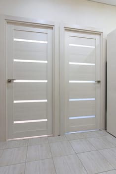 Two interior doors in the apartment close up