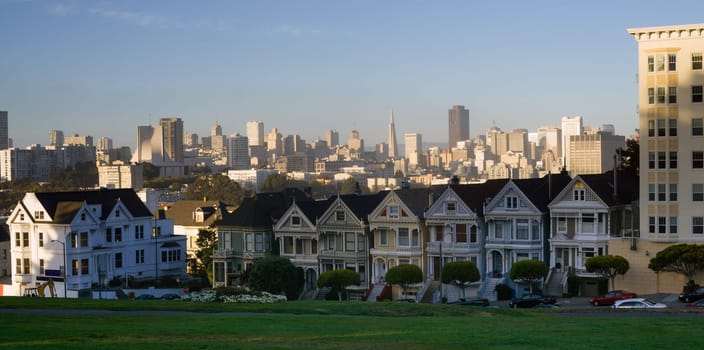 A long horizontal panoramic view of the homes called painted ladies