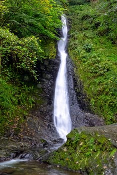 Whitelady waterfall in rain - Lydford, Dartmoor National Park, Devon, United Kingdom