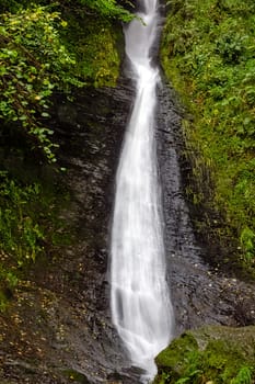Whitelady waterfall in rain - Lydford, Dartmoor National Park, Devon, United Kingdom