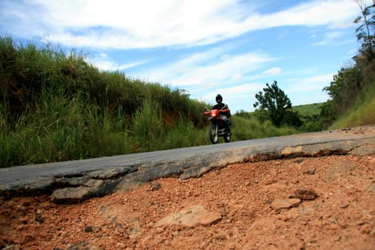 eunapolis, bahia / brazil - april 8, 2009: holes are seen on highway BA 280, a road that connects the municipalities of Itabela to Guaratinga in southern Bahia..