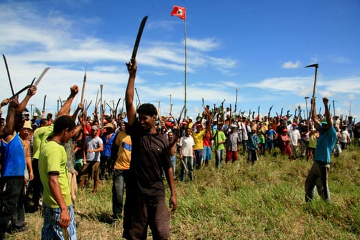 eunapolis, bahia / brazil - april 8, 2009: members of the Movimento Sente Terra - MST - are seen during the occupation of a farm invaded in the rural area of the municipality of Eunapolis....