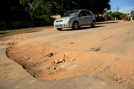eunapolis, bahia / brazil - april 8, 2009: holes are seen on highway BA 280, a road that connects the municipalities of Itabela to Guaratinga in southern Bahia..