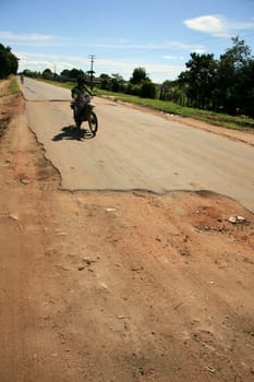 eunapolis, bahia / brazil - april 8, 2009: holes are seen on highway BA 280, a road that connects the municipalities of Itabela to Guaratinga in southern Bahia..