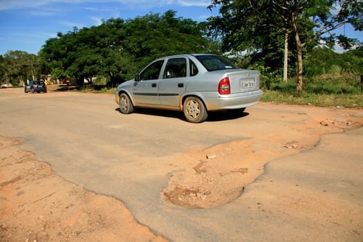 eunapolis, bahia / brazil - april 8, 2009: holes are seen on highway BA 280, a road that connects the municipalities of Itabela to Guaratinga in southern Bahia..
