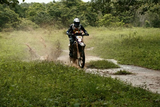 porto seguro, bahia / brazil - april 12, 2009: motorcyclist during motocross enduro in the city of Porto Seguro, in southern Bahia...