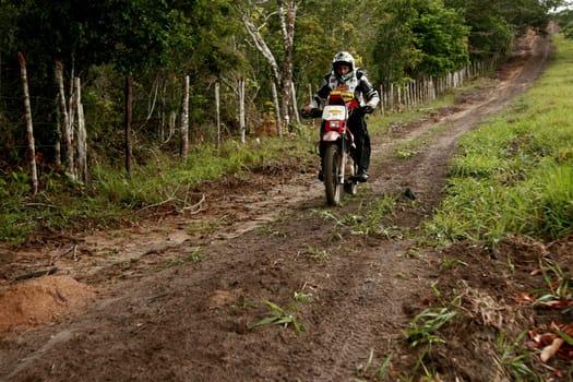 porto seguro, bahia / brazil - april 12, 2009: motorcyclist during motocross enduro in the city of Porto Seguro, in southern Bahia...