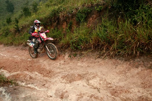 porto seguro, bahia / brazil - april 12, 2009: motorcyclist during motocross enduro in the city of Porto Seguro, in southern Bahia...