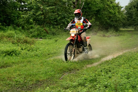porto seguro, bahia / brazil - april 12, 2009: motorcyclist during motocross enduro in the city of Porto Seguro, in southern Bahia...