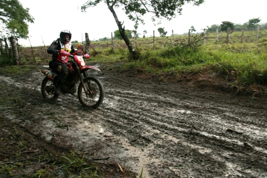 porto seguro, bahia / brazil - april 12, 2009: motorcyclist during motocross enduro in the city of Porto Seguro, in southern Bahia...