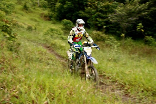 porto seguro, bahia / brazil - april 12, 2009: motorcyclist during motocross enduro in the city of Porto Seguro, in southern Bahia...