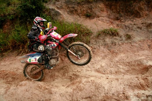 porto seguro, bahia / brazil - april 12, 2009: motorcyclist during motocross enduro in the city of Porto Seguro, in southern Bahia...
