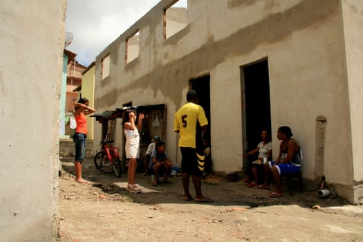 eunapolis, bahia / brazil - january 15, 2009: people who are members of the Association Residents Without a Roof are seen during the invasion of houses under construction, aimed at poor families in the city of Eunapolis....
