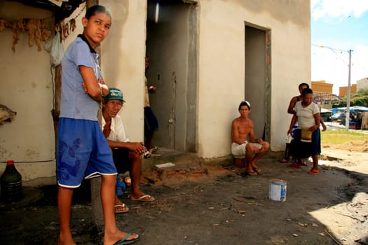 eunapolis, bahia / brazil - january 15, 2009: people who are members of the Association Residents Without a Roof are seen during the invasion of houses under construction, aimed at poor families in the city of Eunapolis....