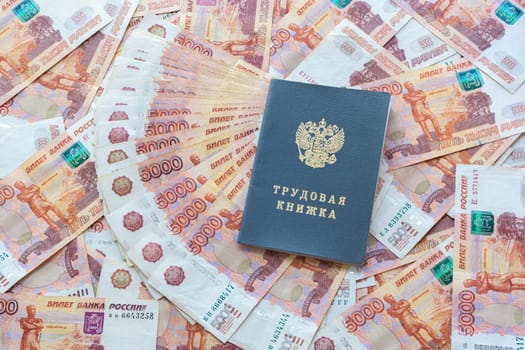 The work book is on the five thousandth Russian rubles