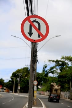 salvador, bahia / brazil - september 11, 2020: traffic sign indicates that it is forbidden to return on the street in the Cabula neighborhood in Salvador.