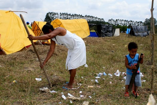 eunapolis, bahia / brazil - april 8, 2009: members of the Movimento Sente Terra - MST - are seen during the occupation of a farm invaded in the rural area of the municipality of Eunapolis....