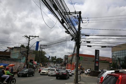 salvador, bahia / brazil - september 11, 2020: Post loaded with wires in the power grid in the neighborhood of Cabula in the city of Salvador..