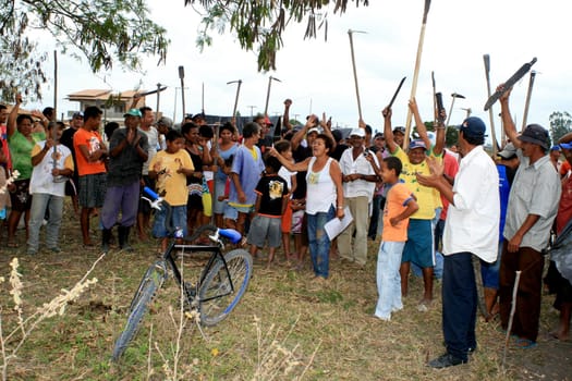 eunapolis, bahia / brazil - april 8, 2009: members of the Movimento Sente Terra - MST - are seen during the occupation of a farm invaded in the rural area of the municipality of Eunapolis....