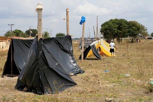 eunapolis, bahia / brazil - april 8, 2009: members of the Movimento Sente Terra - MST - are seen during the occupation of a farm invaded in the rural area of the municipality of Eunapolis....
