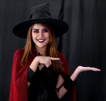 Portrait of asian young adult teenage woman wear Halloween costume cloth for Halloween party carnival. Halloween celebrate and international holiday concept.