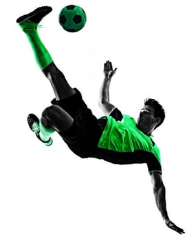 one young caucasian soccer player silhouette shadow in studio isolated on white background