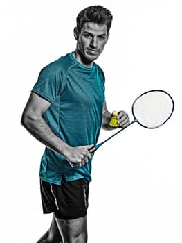 one caucasian youg Badminton player man in studio isolated on white background
