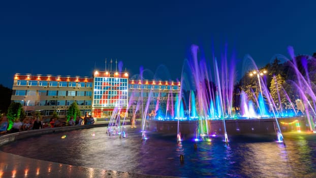 Anapa, Russia - July 17, 2020: Panorama with the building of the city administration of the Anapa resort and a large beautiful fountain located in front of it