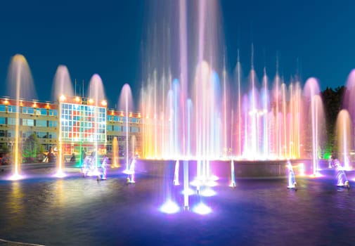 Anapa, Russia - July 17, 2020: Many vertically directed jets of the fountain in front of the city administration building of the Anapa resort