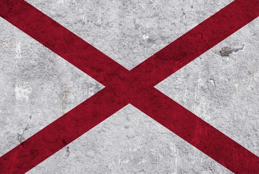 Flag of Alabama on weathered concrete