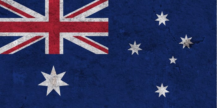 Flag of Australia on weathered concrete