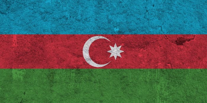 Flag of Azerbaijan on weathered concrete