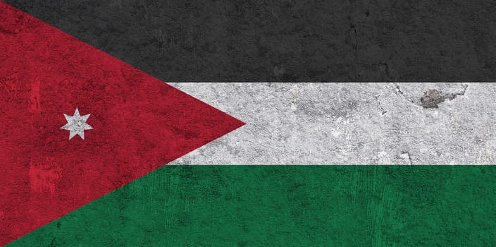 Flag of Jordan on weathered concrete