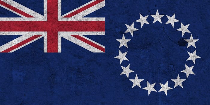 Flag of Cook Islands on weathered concrete
