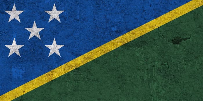 Flag of Solomon Islands on weathered concrete