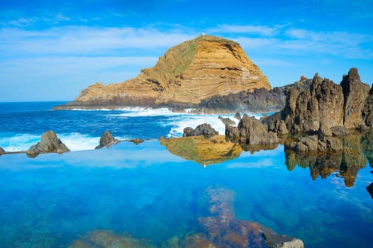 Bathes in natural lava ocean pools. Lava pools are the main attraction of Madeira.