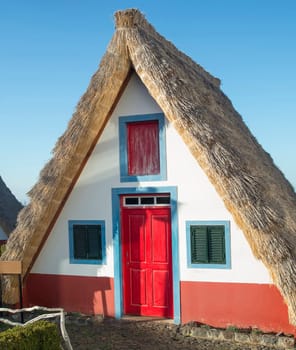 Traditional famous rural houses in Santana, Madeira island, Portugal.
