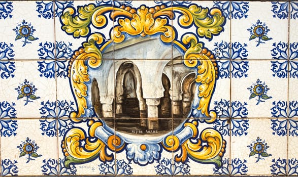 Caceres, Spain - May 27th, 2020: Moorish cistern. Key landmarks of Caceres City on glazed tiles.
