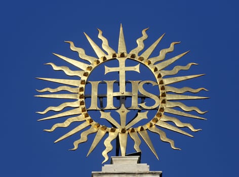 IHS sign on Jesuits church in Vienna, Austria