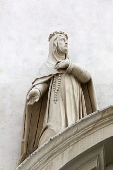 Catherine of Siena on the facade of Dominican Church in Vienna, Austria