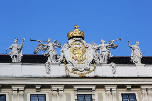 Architectural artistic decorations on Hofburg palace, Vienna, Austria