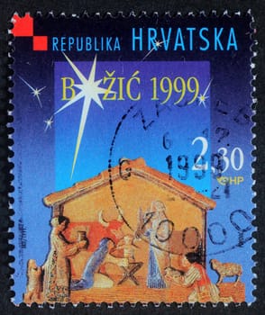 Christmas stamp printed in the Croatia shows Christmas Creche, circa 1999
