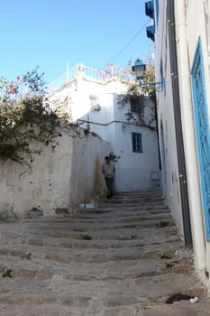 Sidi Bou Said - typical building with white walls, blue doors and windows, Tunisia