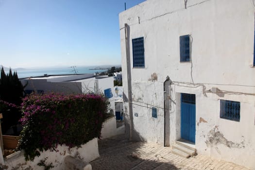 Sidi Bou Said - typical building with white walls, blue doors and windows, Tunisia